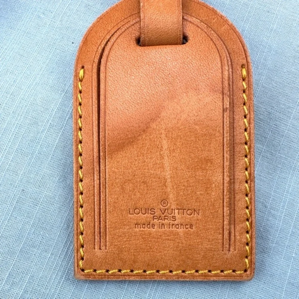 AUTHENTIC Vachetta Leather Luggage tag and loop.